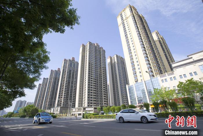 資料圖：車輛從一樓盤前經(jīng)過。 <a target='_blank' href='/'><p  align=